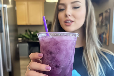 Loaded Tea Shop influencer holding a purple loaded tea